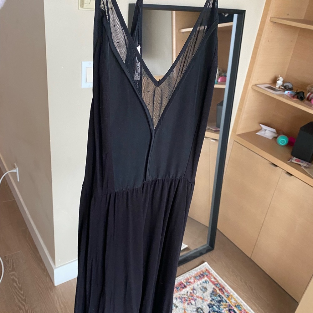 Black dress with mesh lining on the front and mesh back
